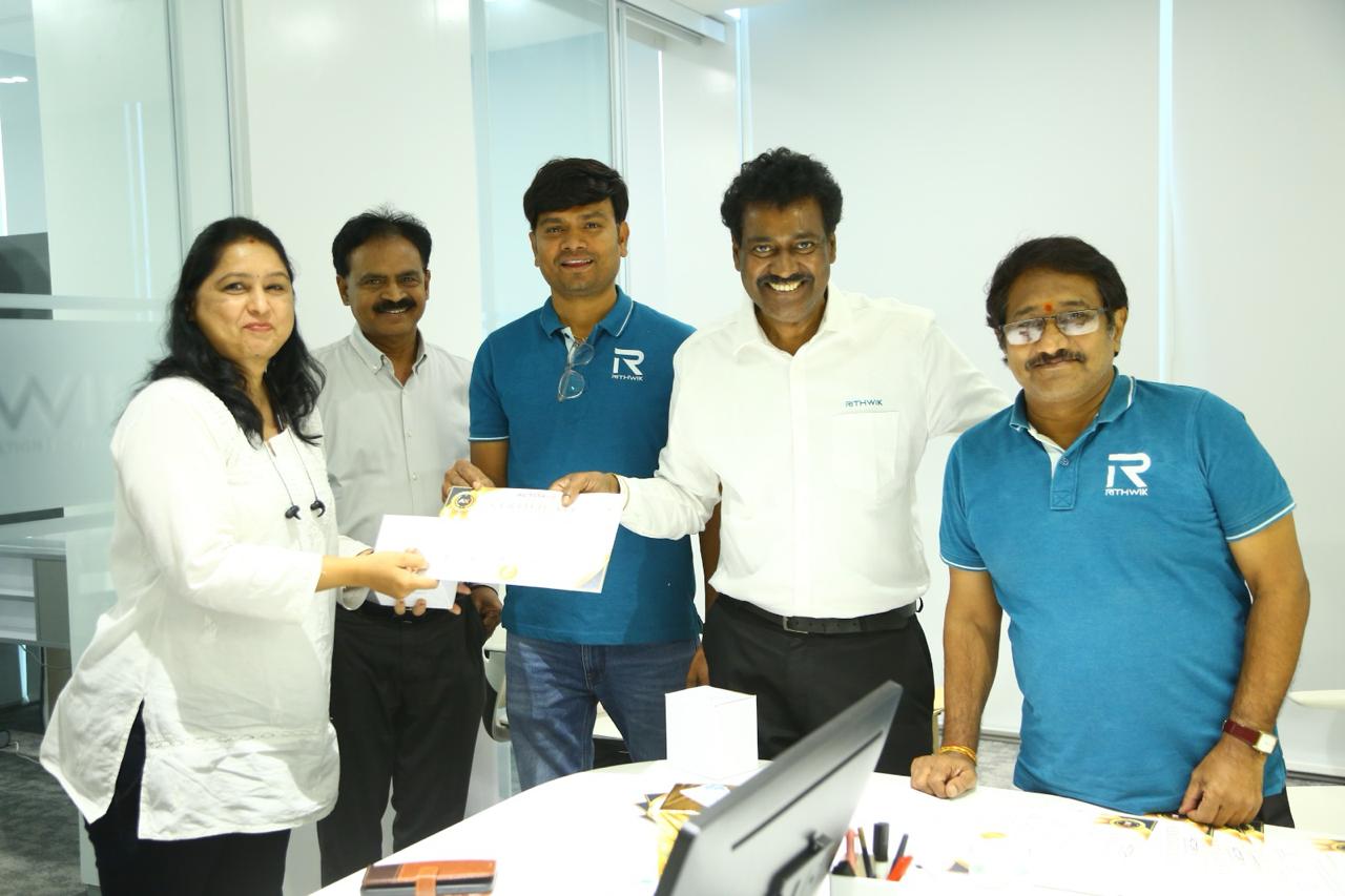 Group certificate presentation to Rithwik team members